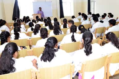 MBBS students in white coats attending a lecture at S S Institute of Medical Sciences & Research Centre, Davangere