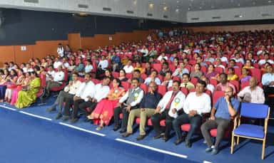 Students and faculty filling the auditorium during an event at S S Institute of Medical Sciences & Research Centre, Davangere