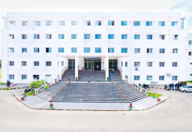 Front view of the Subbaiah Institute of Medical Sciences college building with its wide entrance steps, Purale, Shimoga
