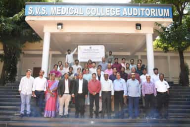 Faculty of SVS Medical College gathered on the steps of the S.V.S. Medical College Auditorium after a Medical Education Unit programme