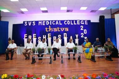 Faculty on stage at the SVS Medical College Freshers' Day cultural event Thatva 2023