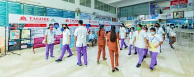 Students and staff in the main lobby of Tagore Medical College and Hospital, Chennai