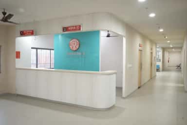 Wide view of the Takshashila Medical College Hospital reception block and main corridor