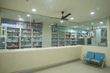 Stocked pharmacy counter at Takshashila Medical College Hospital