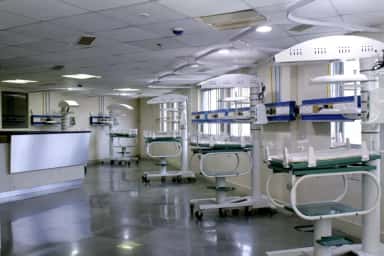 Neonatal intensive care unit with a row of infant warmer cots at Terna Speciality Hospital & Research Centre, Navi Mumbai