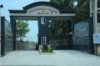 Stone entrance archway reading VELS Medical College & Hospital
