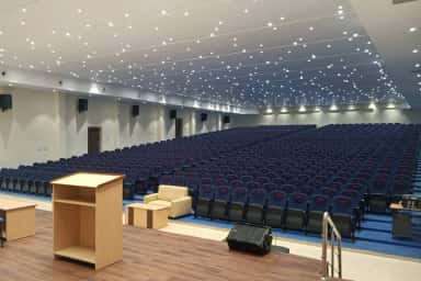 Modern auditorium with tiered seating at VELS Medical College & Hospital
