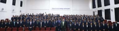 Zydus Medical College and Hospital students assembled in the college auditorium beneath the institution's name board