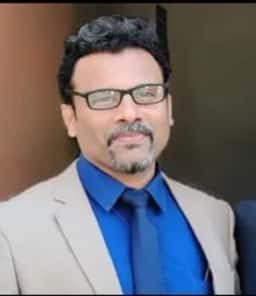 Dr. Kiran M Naik