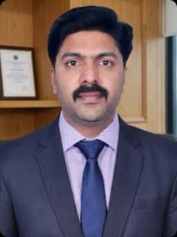 Dr. Santhosh T C M