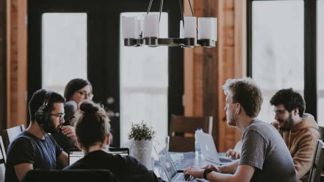 Engineering graduates in a professional workplace