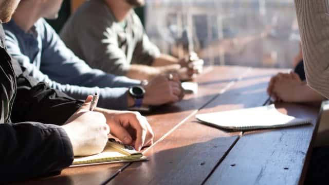 Engineering graduates in a professional workplace