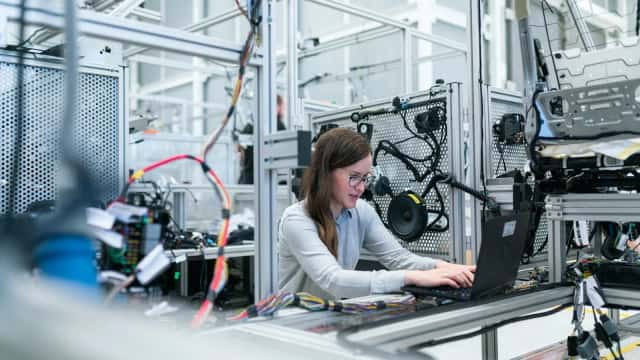 Computer-science student working on a laptop