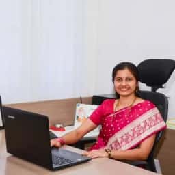 Dr. Asha V
