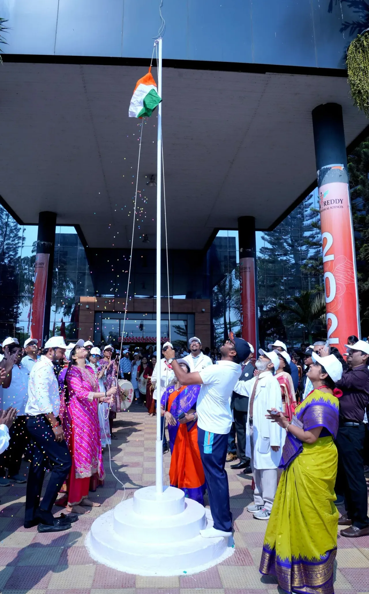 Flag-hoisting ceremony at the main entrance of Malla Reddy Institute of Medical Sciences, Suraram