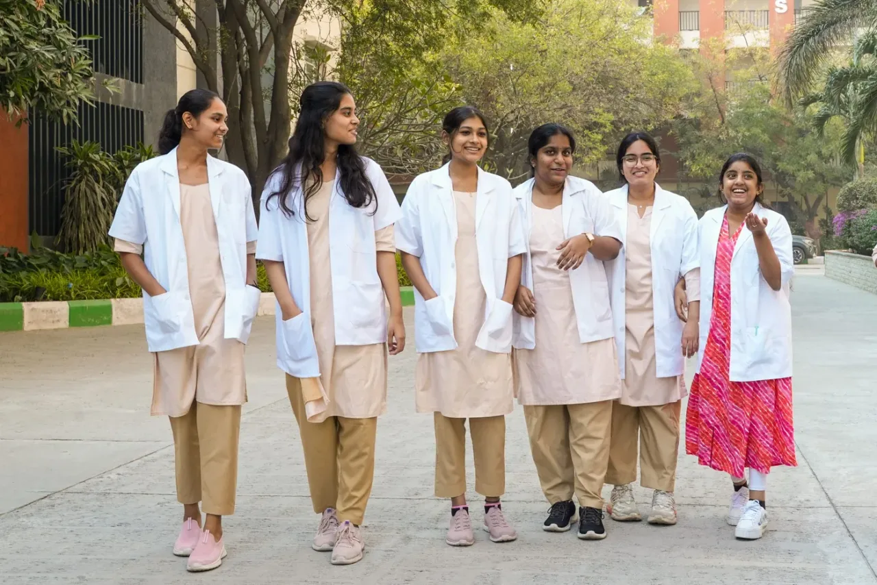Medical students walking through the Mamata Academy of Medical Sciences campus at Bachupally