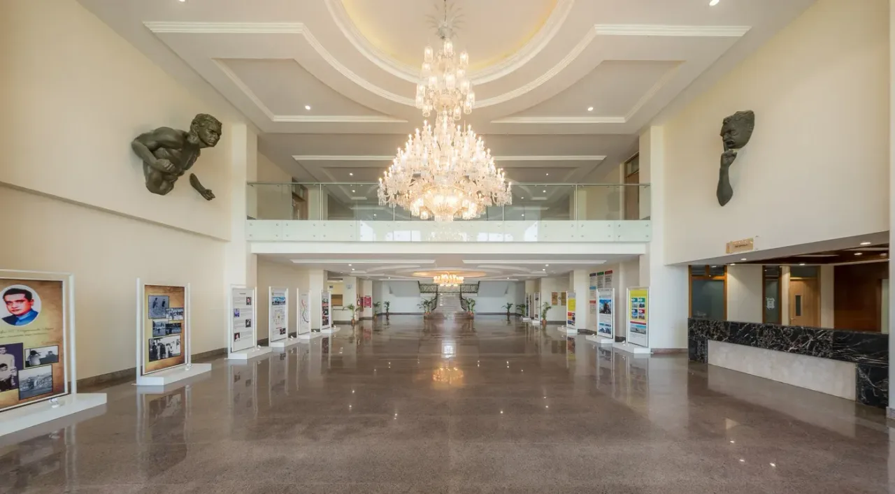 CDSIMER lobby with the founder-history exhibition and chandelier