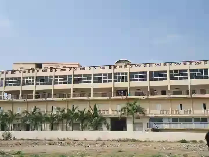 Campus building exterior from the entrance grounds — Bellary Institute of Nursing