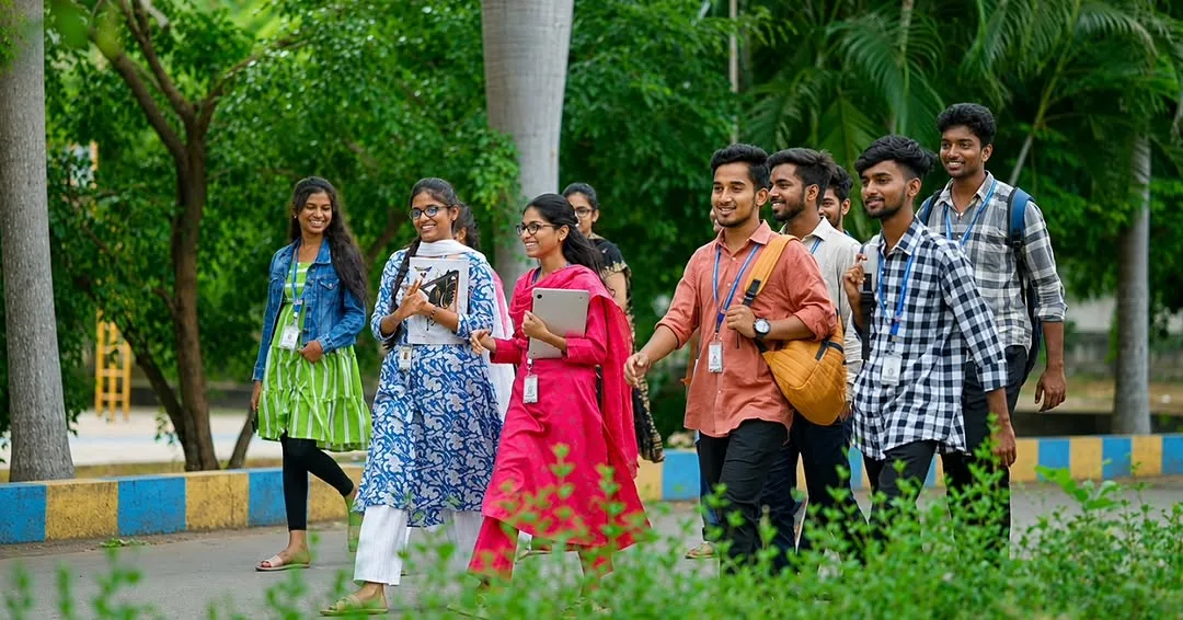 A group of SVPP students walking through the campus avenue — Sri Venkatesa Perumal College of Engineering and Technology