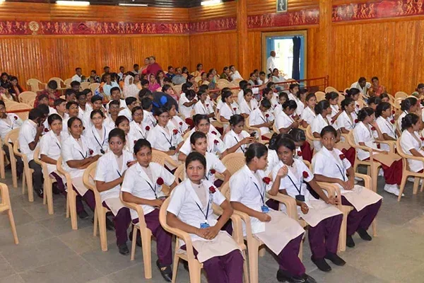 Nursing students seated in the auditorium during an institutional event — Kumuda School of Nursing