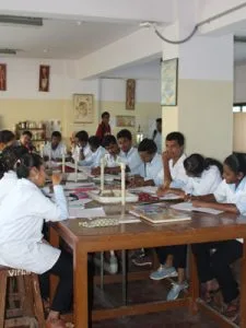 Vivekananda College of Pharmacy — Laboratories Page Image Captioned Pharmcy Lab