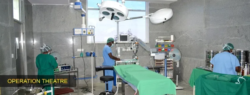 Operation theatre at Sambhram Hospital, KGF, with surgical lights and monitoring equipment (archived college photo, 2024)