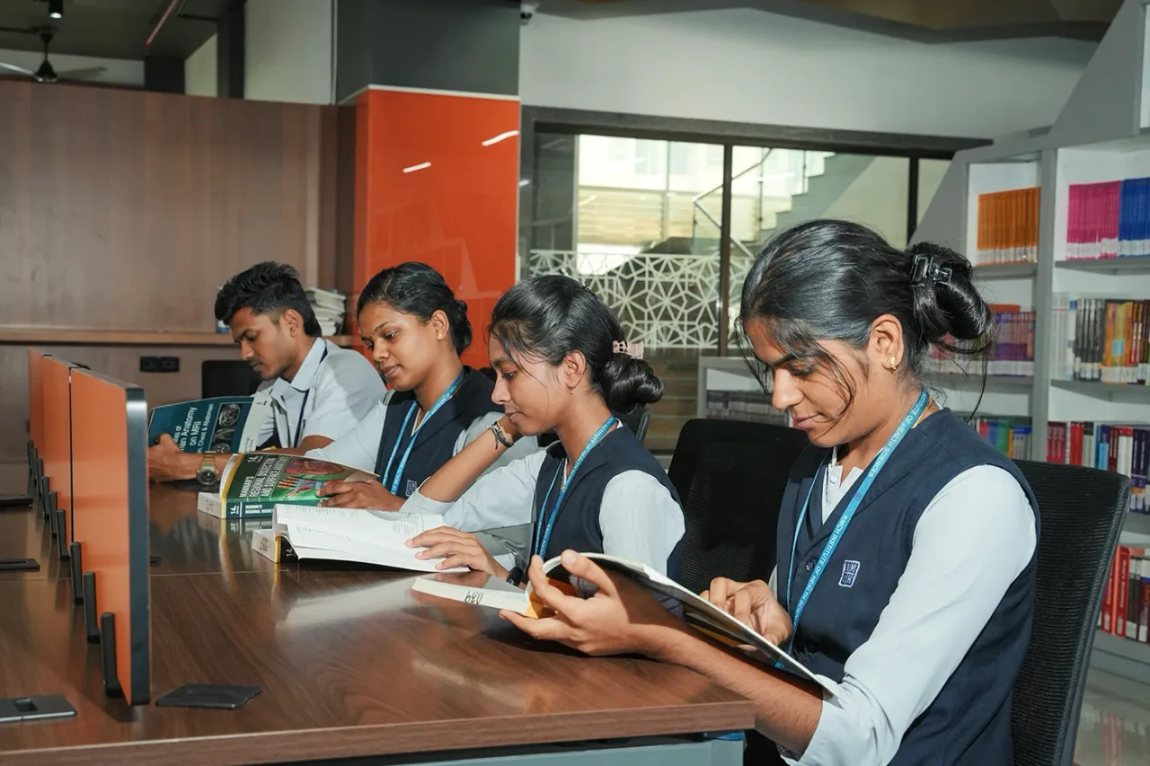 Students collaborating on a project — KMCH Institute of Allied Health Sciences