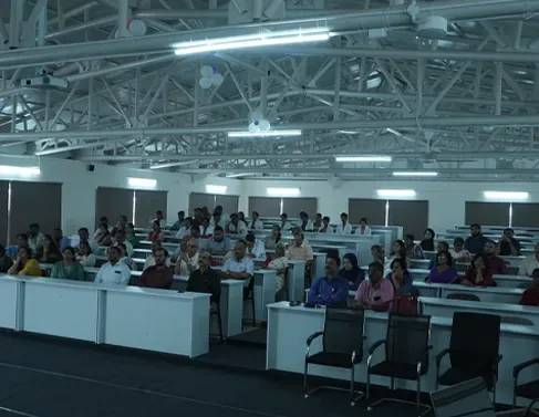 Students seated in a large lecture hall at FAME, Mysuru