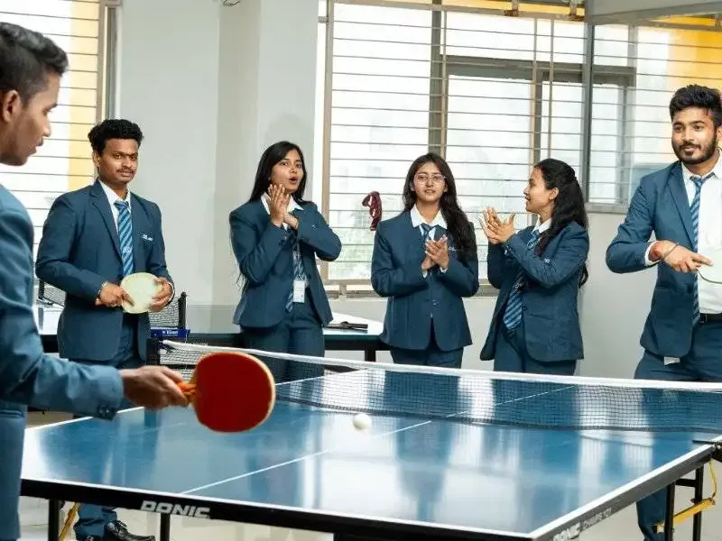ABBS Bangalore students enjoying table tennis on campus. — Acharya Bangalore B-School