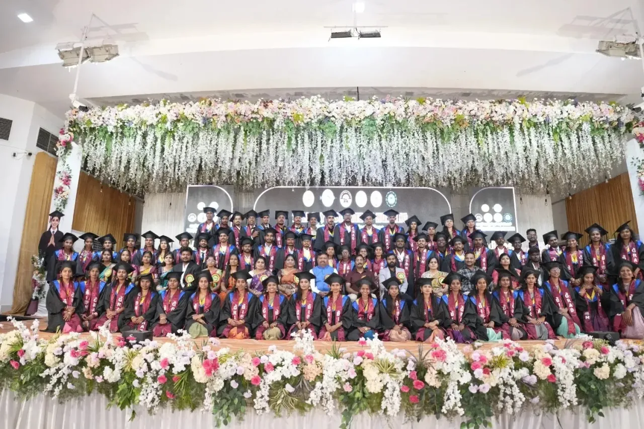 Students and faculty gathered on stage for an official college ceremony — Bellary Institute of Nursing