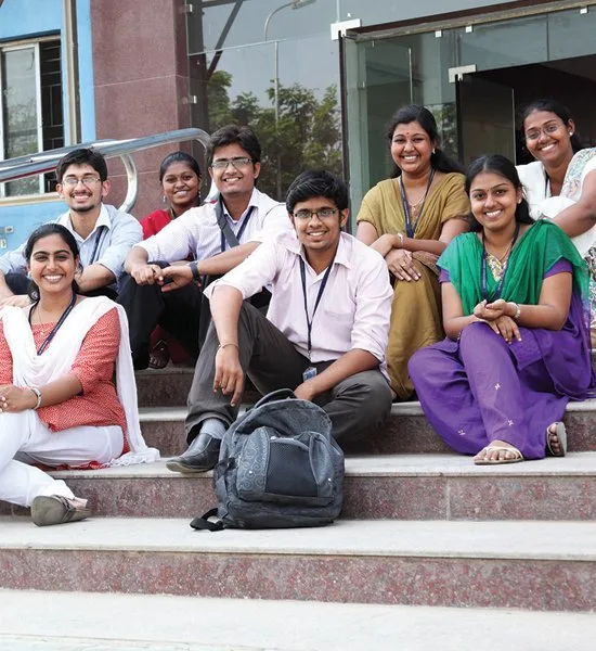 Rajalakshmi Institute of Technology students sitting on campus steps in Chennai