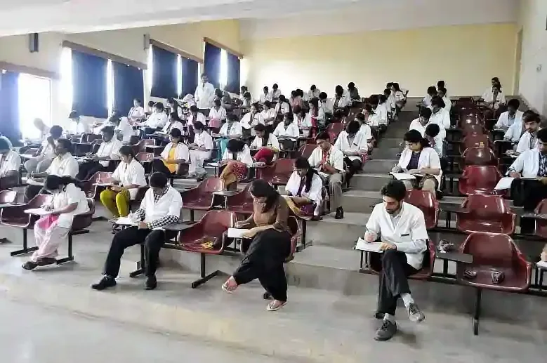 Students in the tiered lecture hall at Dr. B.R. Ambedkar Medical College, Bengaluru
