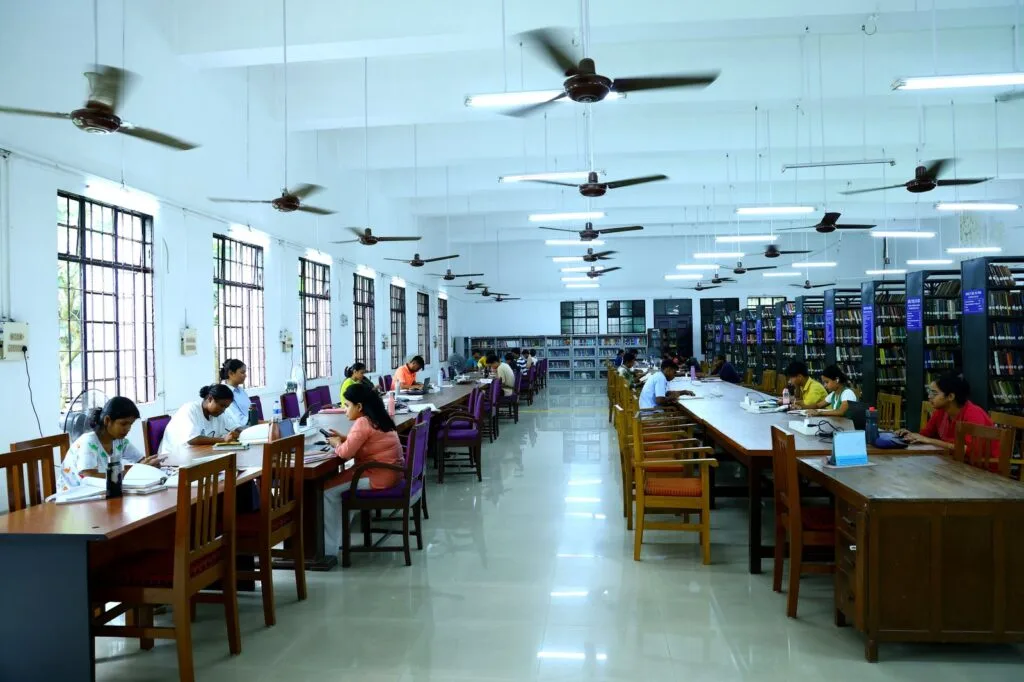 Students in the Library reading room — gauhati-university-guwahati