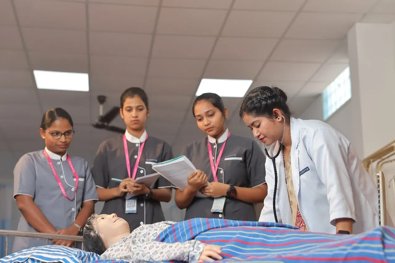 Nursing students practicing patient care in a skills laboratory — Bangalore Little Flower College of Nursing