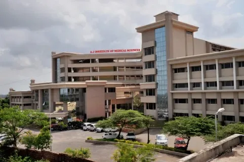 A J Institute of Medical Sciences campus buildings seen from the approach road, Kuntikana