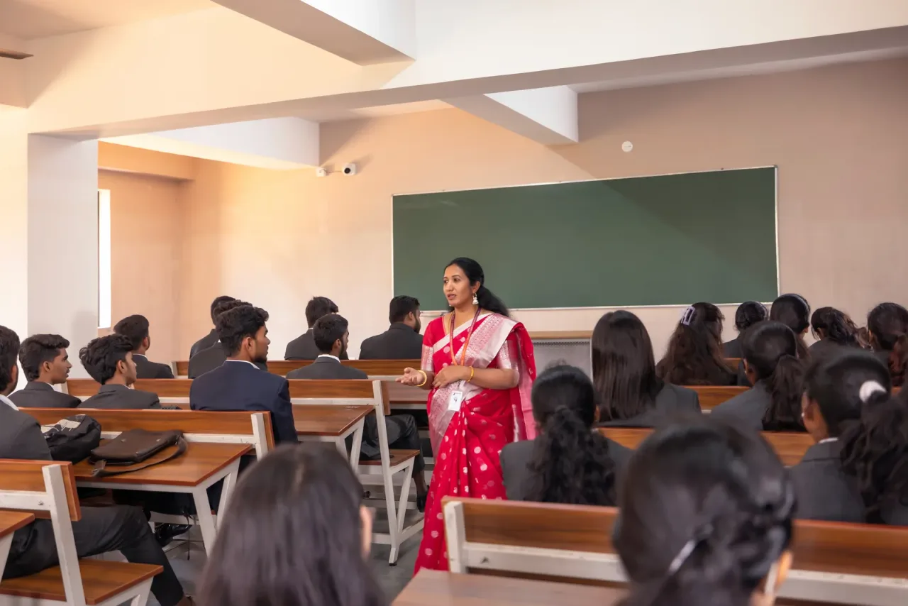 Faculty member teaching students in a classroom — Spurthy College of Nursing (Spurthy Institutions)
