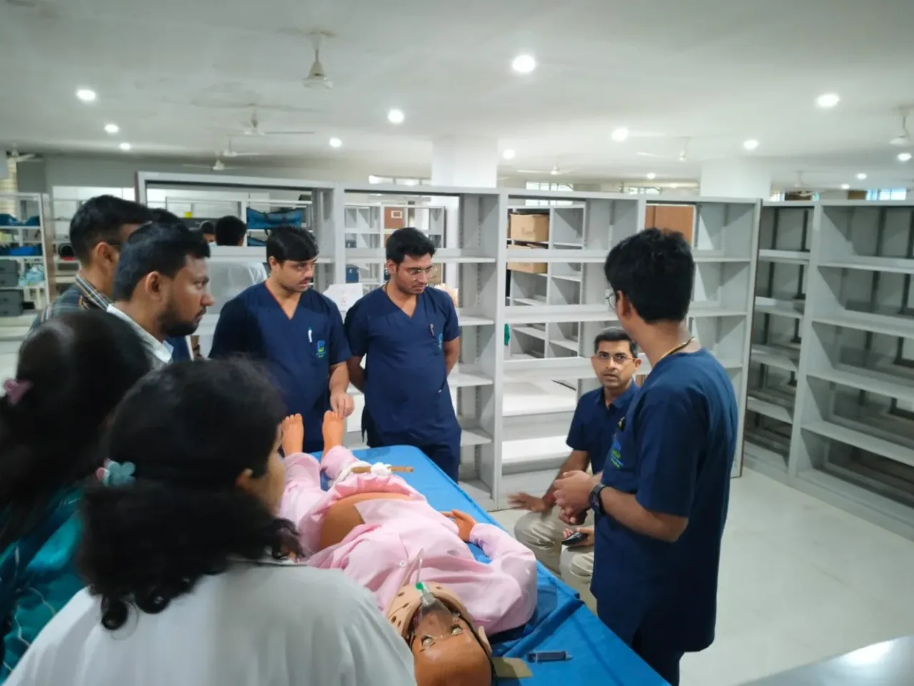 Faculty demonstrating airway management on a simulation manikin in the skill lab at Mahadevappa Rampure Medical College