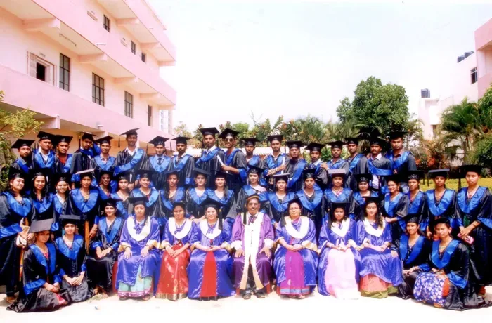 Large outdoor graduation group with students and faculty — Bangalore City College of Nursing