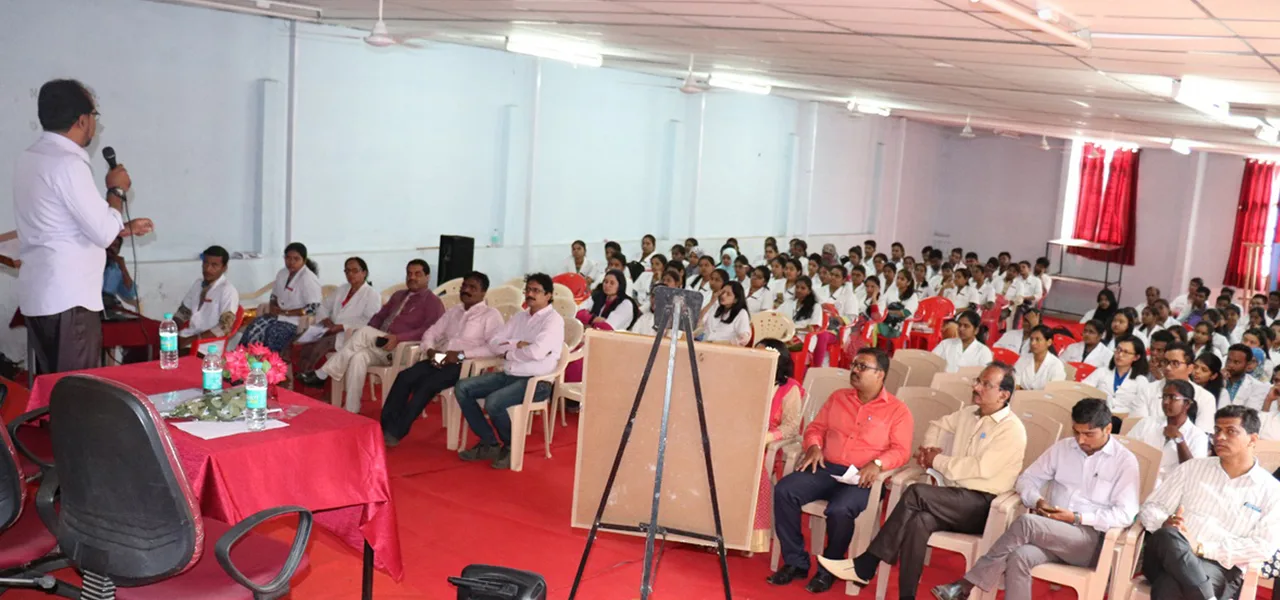 Bamane Institute of Pharmacy — Homepage Slider Image Seminar Classroom Hall With Students In Pharmacy Coats