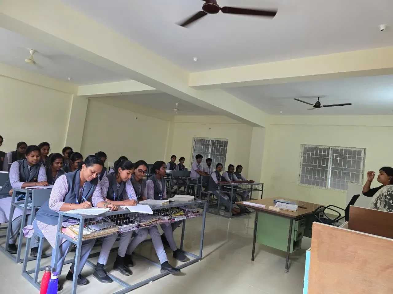 Students attending a classroom session at Shubham College of Nursing