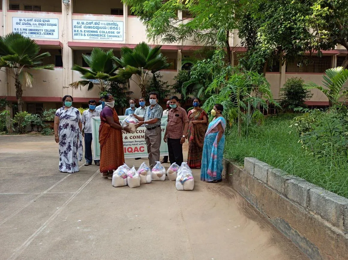 BES Evening college staff distributing essential items - principal