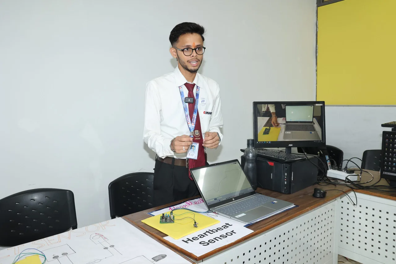A CIMAGE CCDTE student testing a heartbeat sensor — a hands-on IoT biomedical project — CIMAGE Centre of Digital Technology and Entrepreneurship