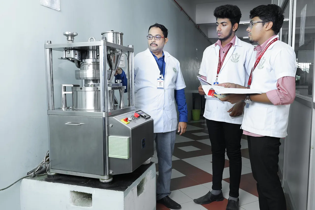 Teacher Explaining to the Students at KK College of Pharmacy — K.K. College of Pharmacy