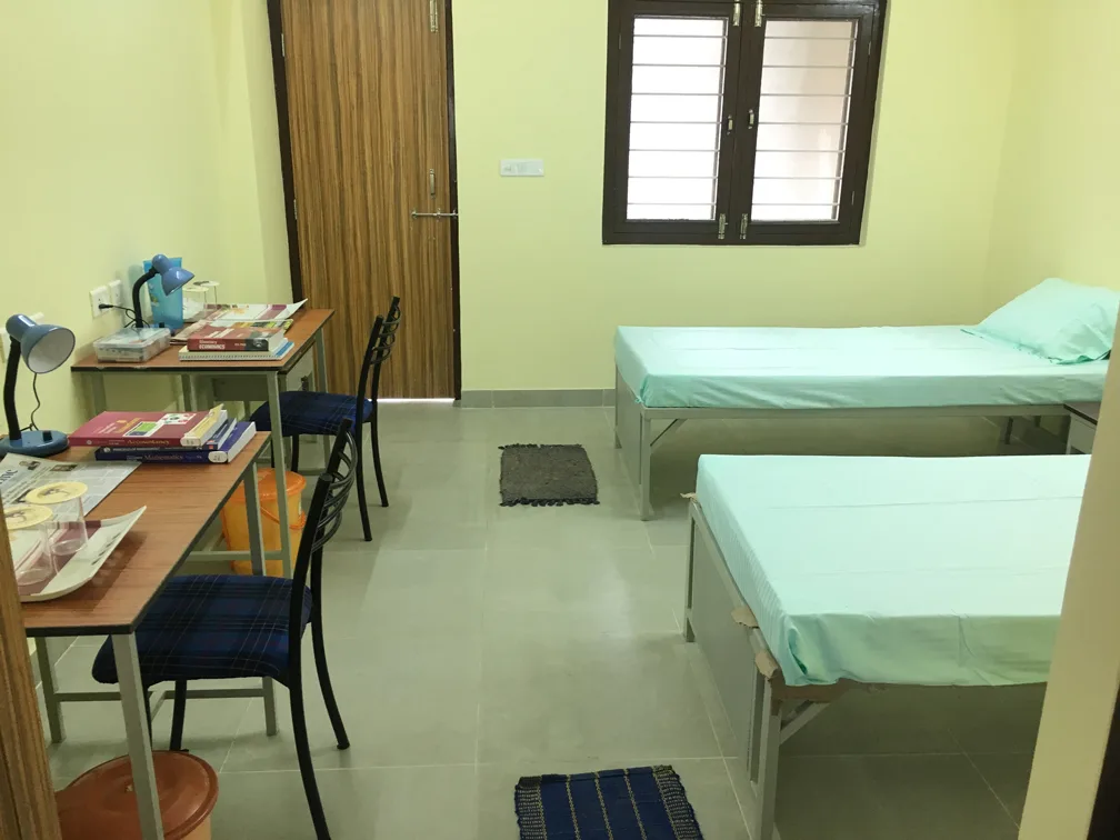 Boys hostel room — Institute of Insurance and Risk Management