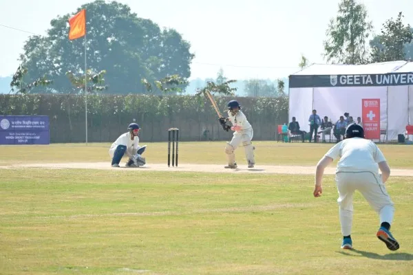 Students playing cricket — Geeta University
