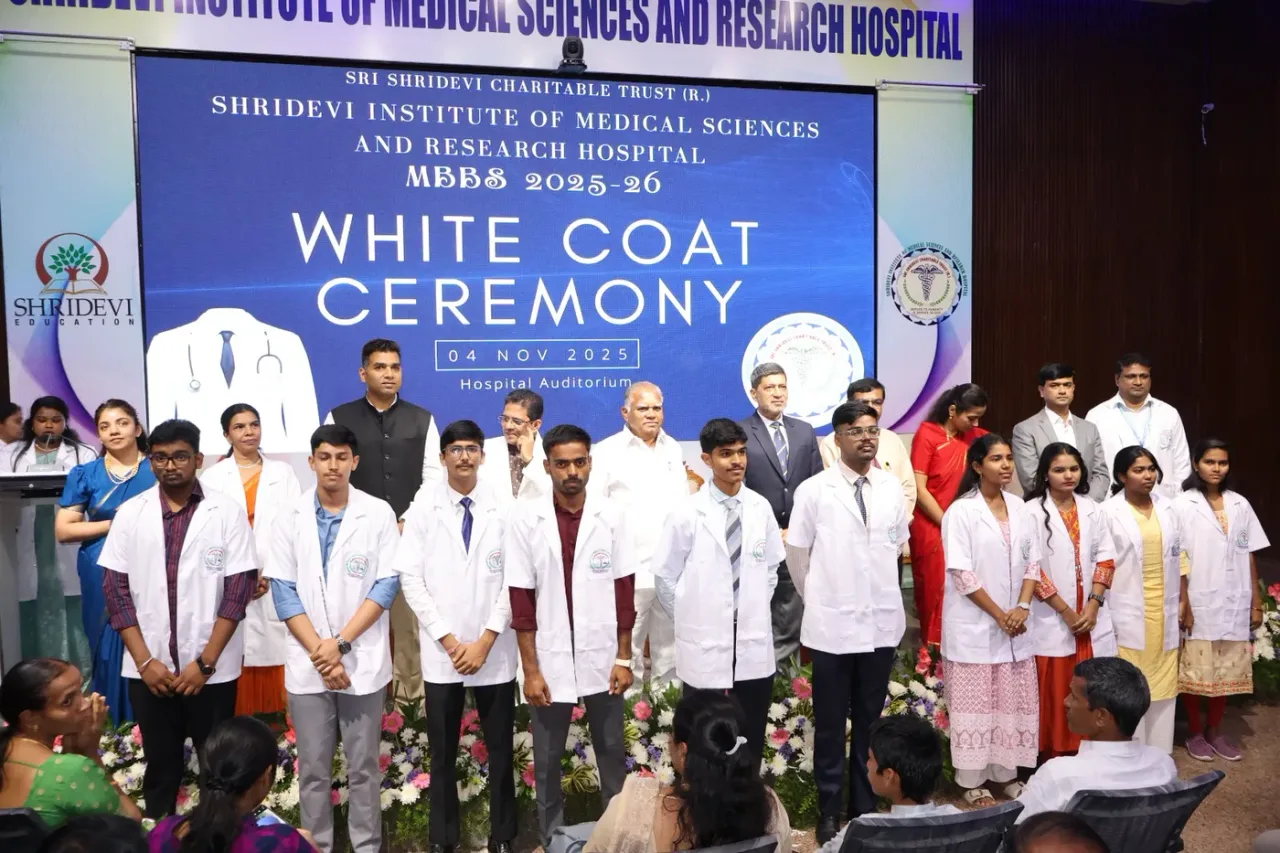 White Coat Ceremony for the MBBS 2025-26 batch in the hospital auditorium at Shridevi Institute of Medical Sciences Tumkur
