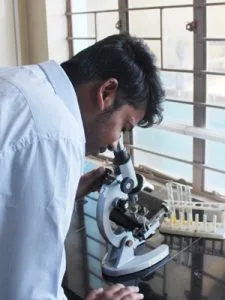 Vivekananda College of Pharmacy — Laboratories Page Image Showing Microscopy Lab Use