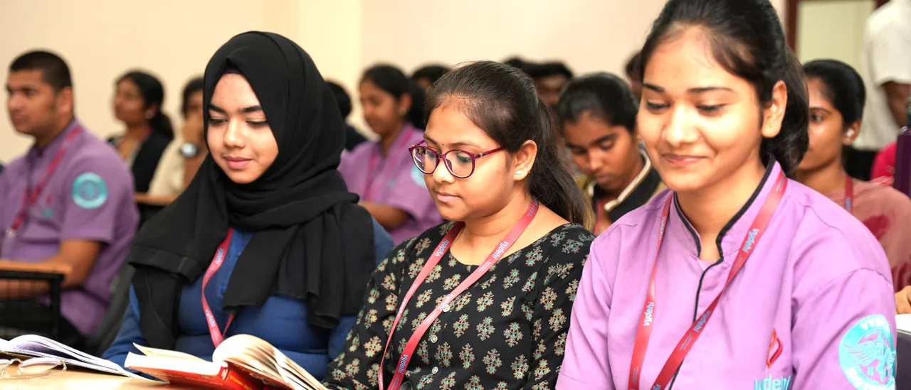 Students at Vymak Degree College
