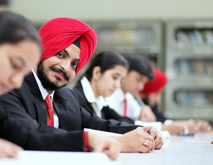 Students in library — Guru Nanak Institute of Management