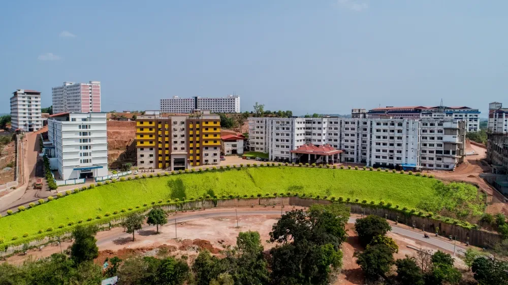 Aerial view of Alva's campus building and landscaped grounds — Alva's College of Nursing